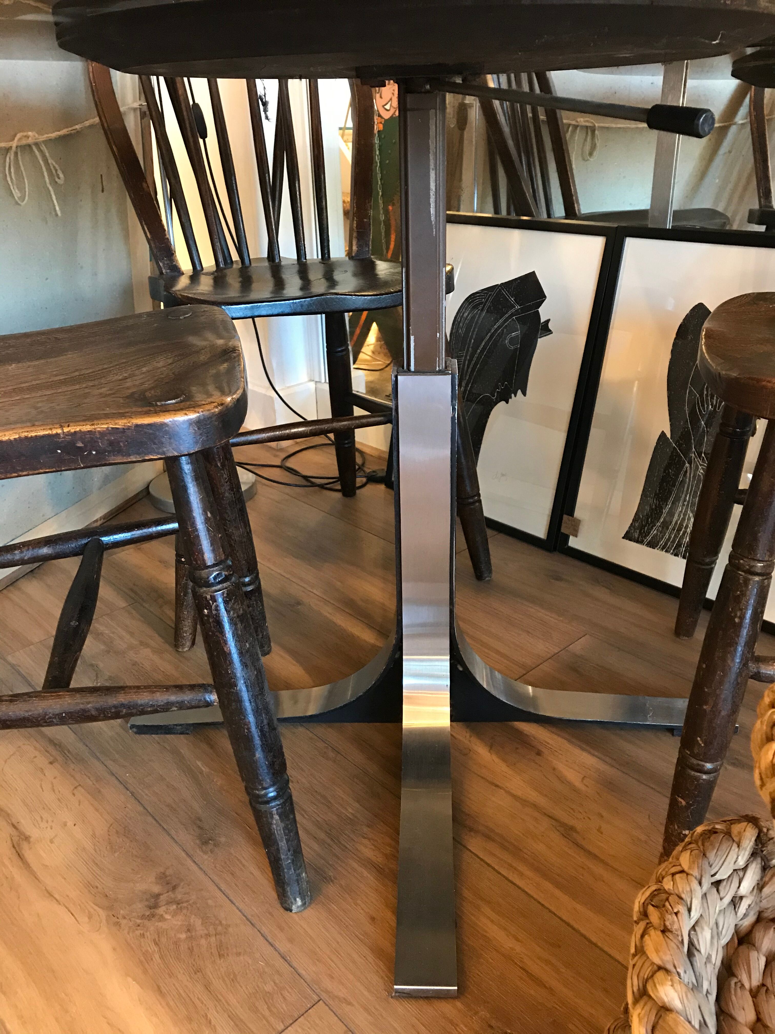 Smoky glass liftable round table