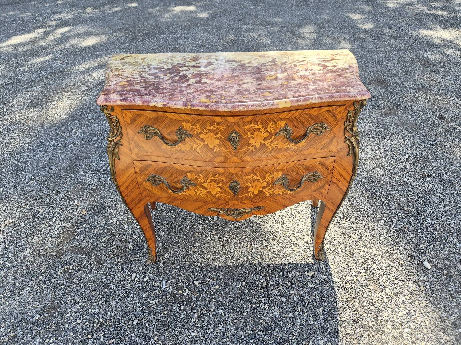 Louis XV style jump commode with marquetry and marble decoration.