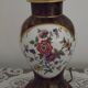 French Limoges Hergé table lamp base with gold highlights and floral decoration.