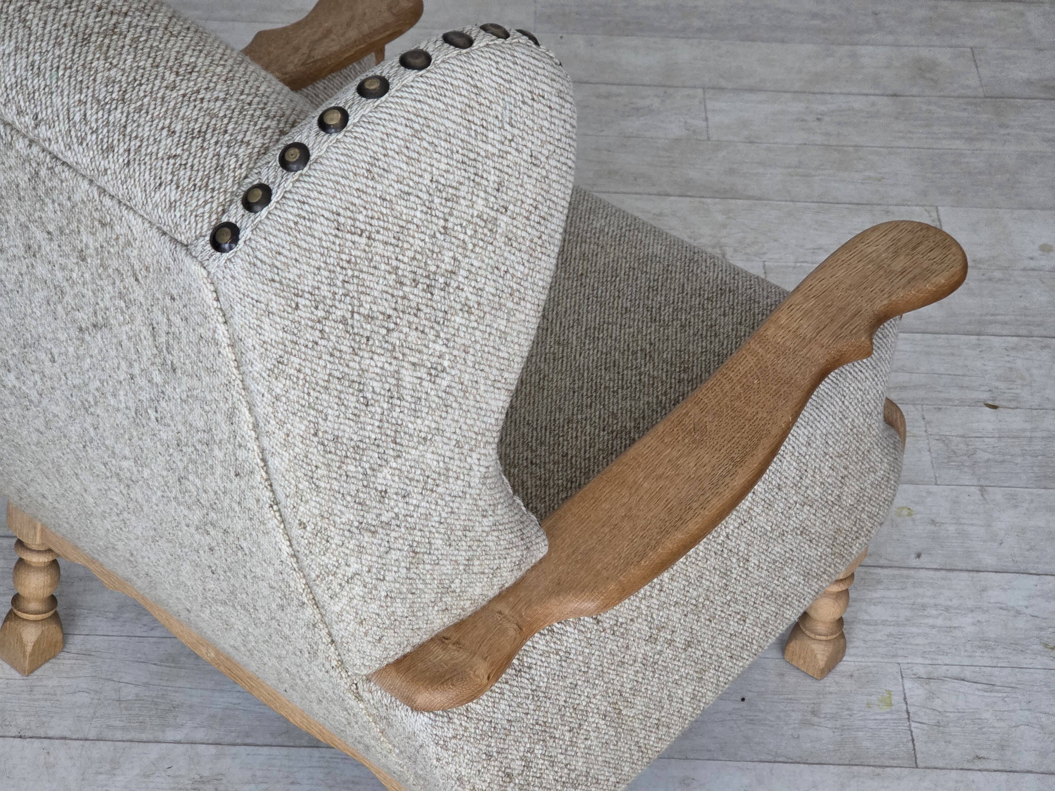 1970s, Danish highback armchair, furniture wool, solid oak wood.