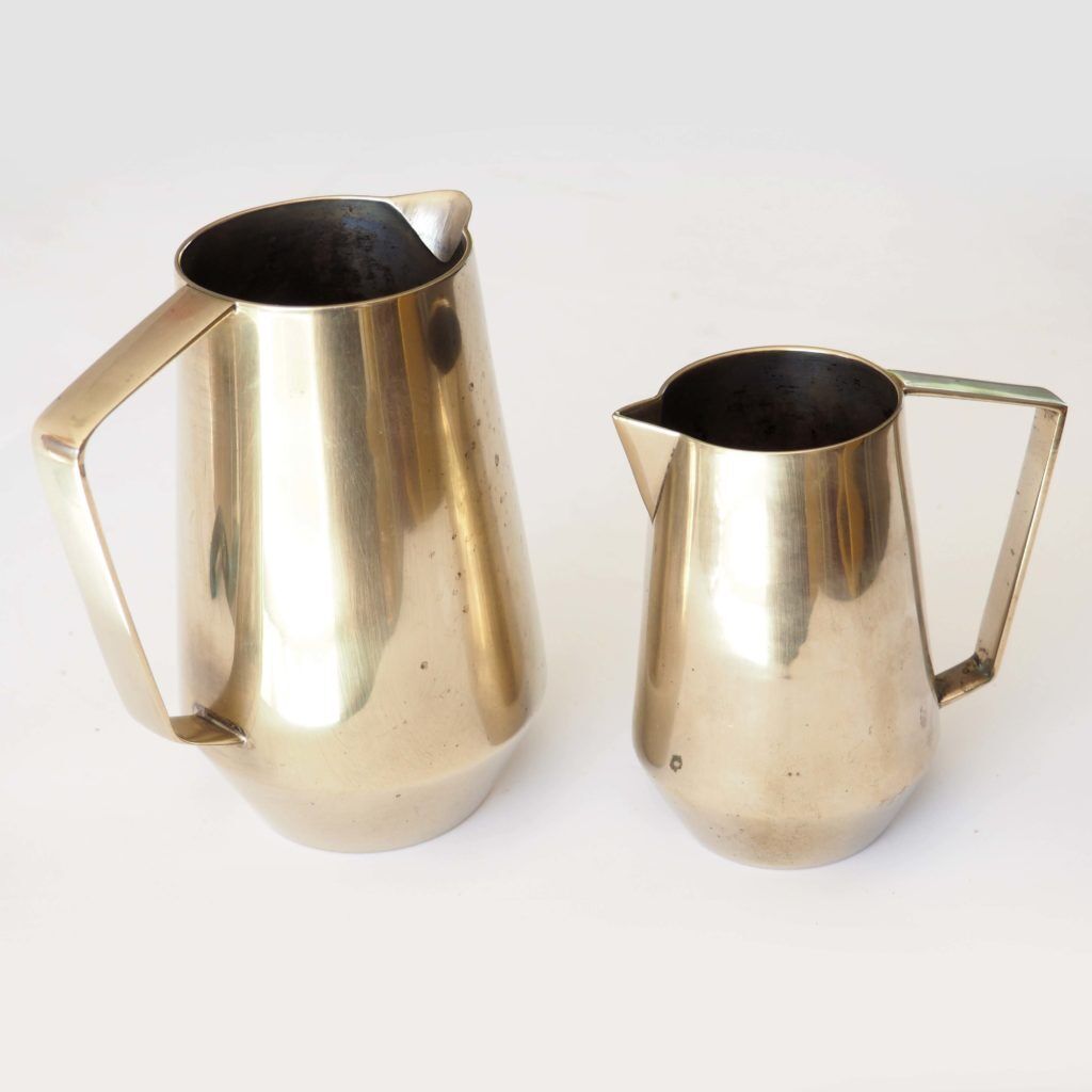 Duo of bronze pitchers