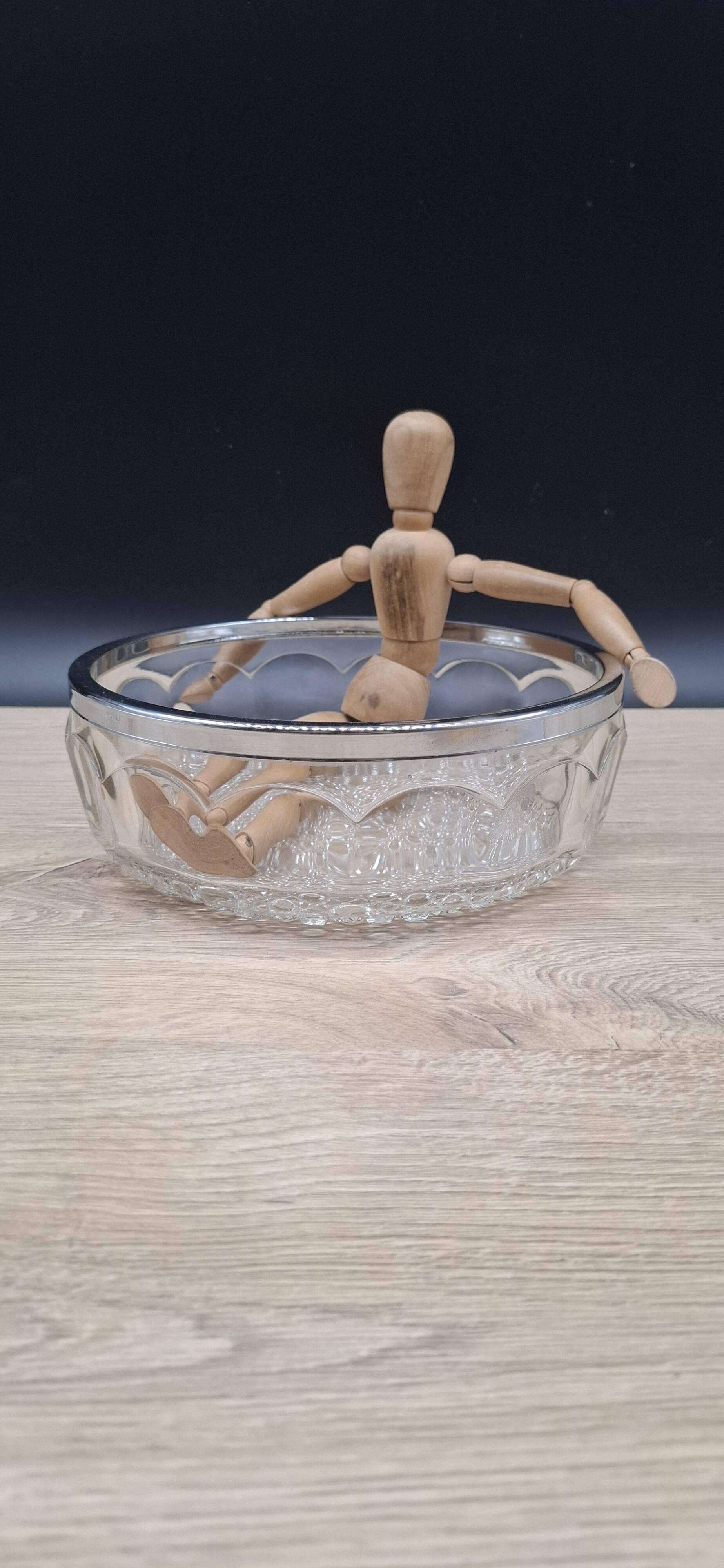 Chiseled glass salad bowl with metal rim