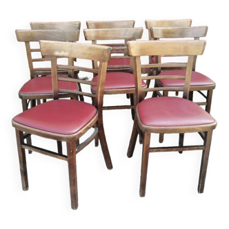 Lot de 8 chaises bistrot TON en bois et skaï rouge vintage.