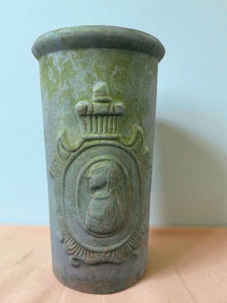 Vintage stone pot / vase with medallion