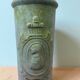 Vintage stone pot / vase with medallion
