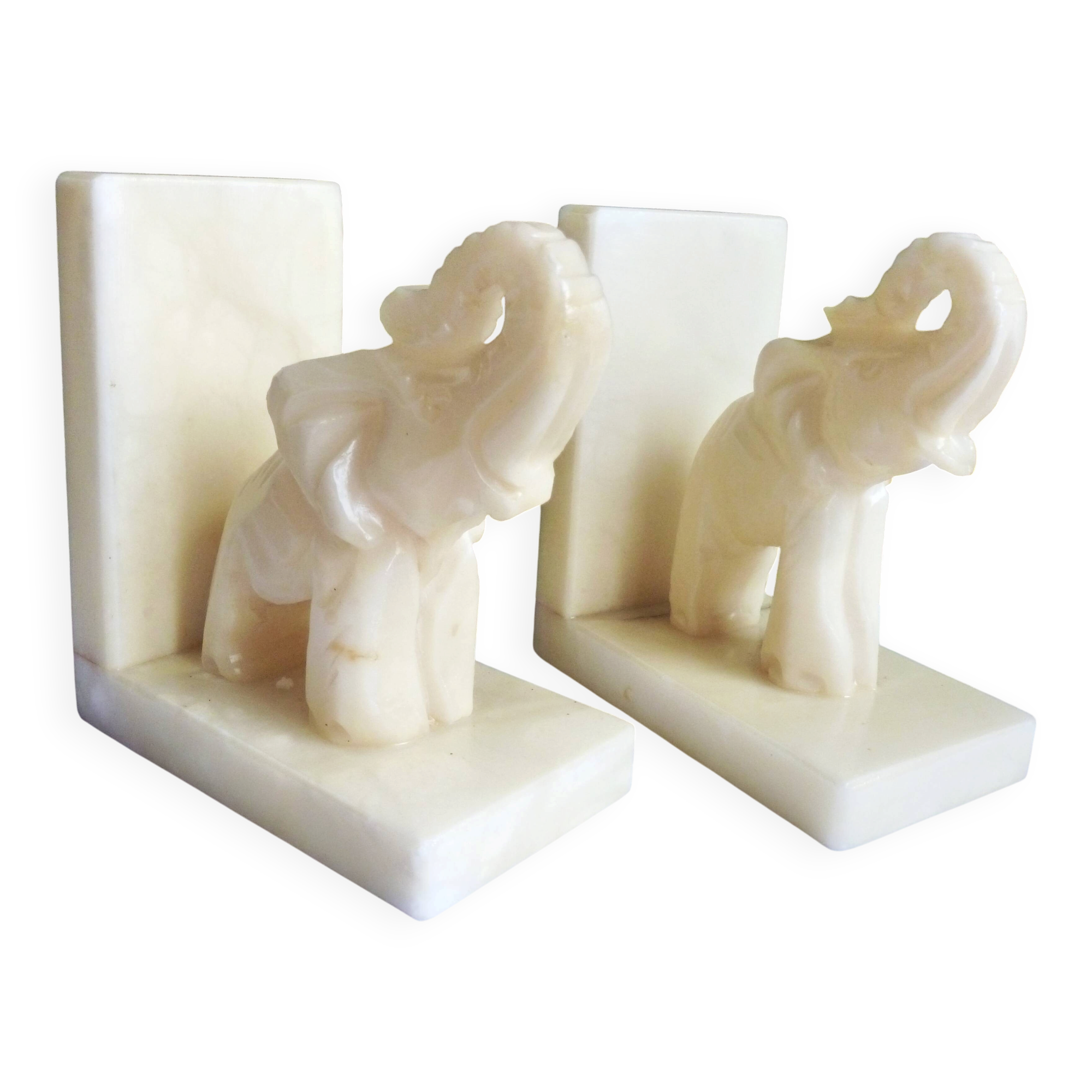 Elephant bookends in alabaster, Pair of elephant bookends.