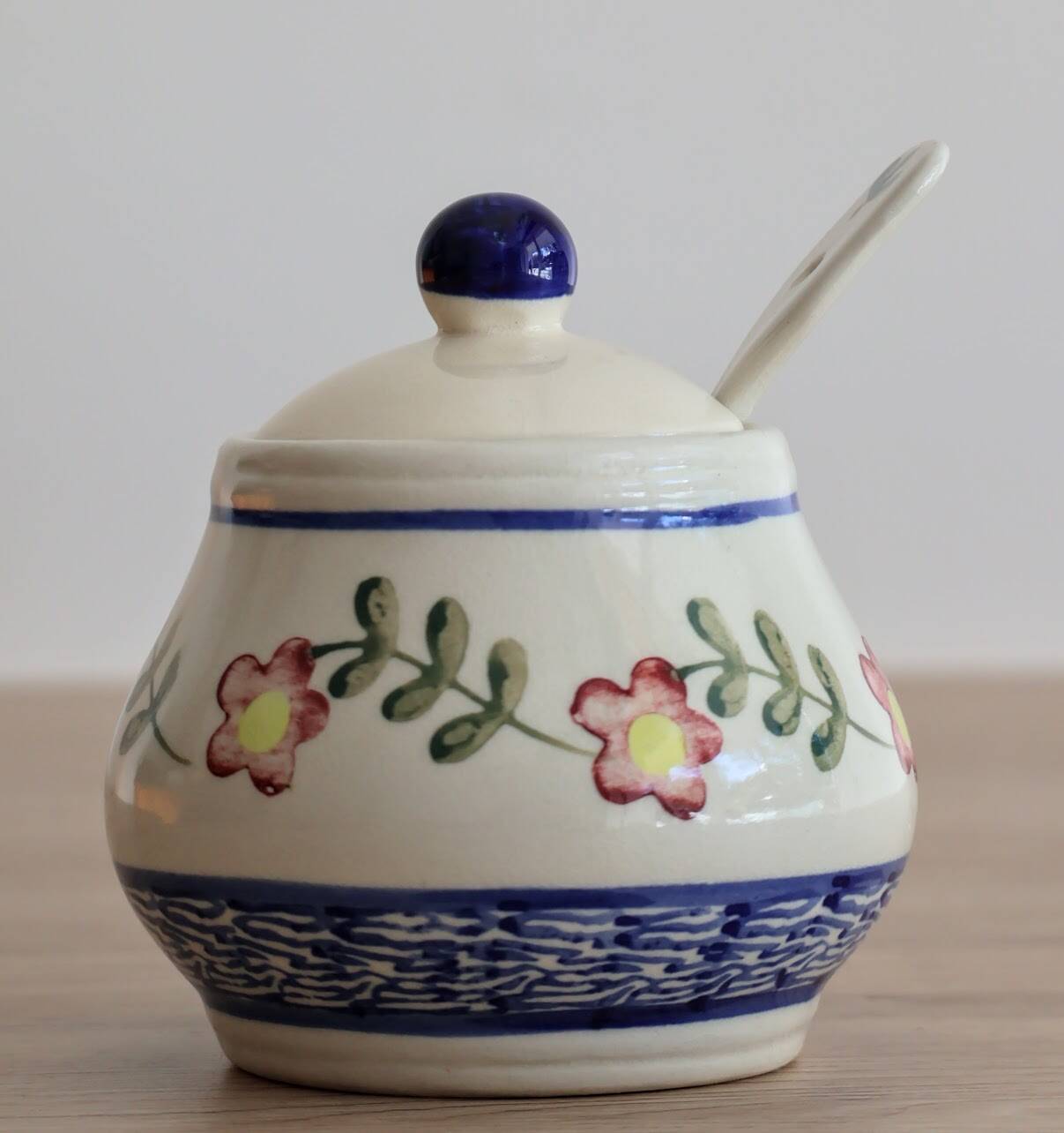 Ceramic jam pot with floral decoration