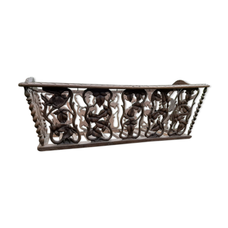 Ancient cradle carved wood