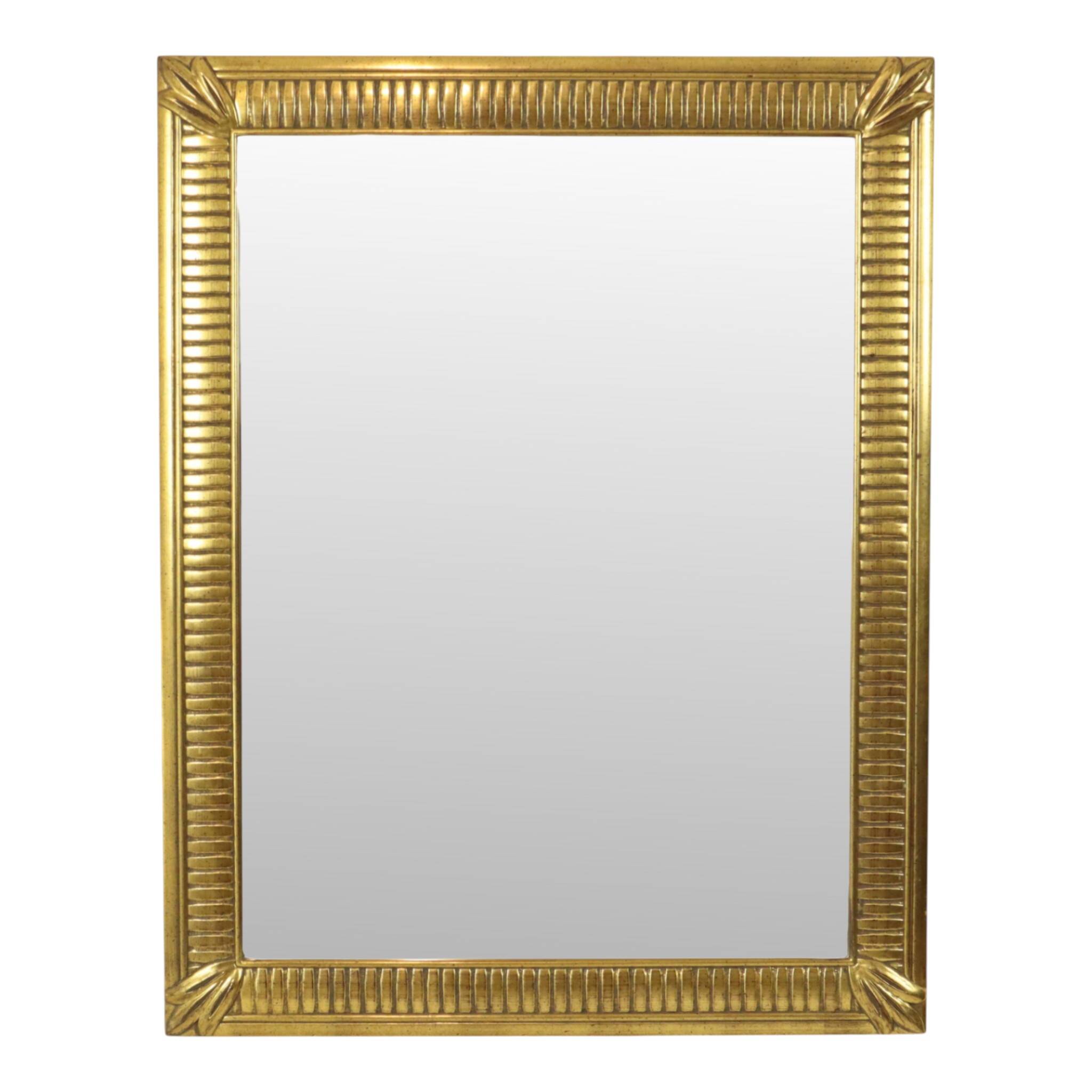 Miroir Deknudt en or Hollywood Regency biseauté 92 cm