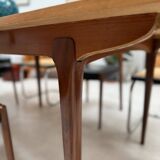 Extendable teak dining table