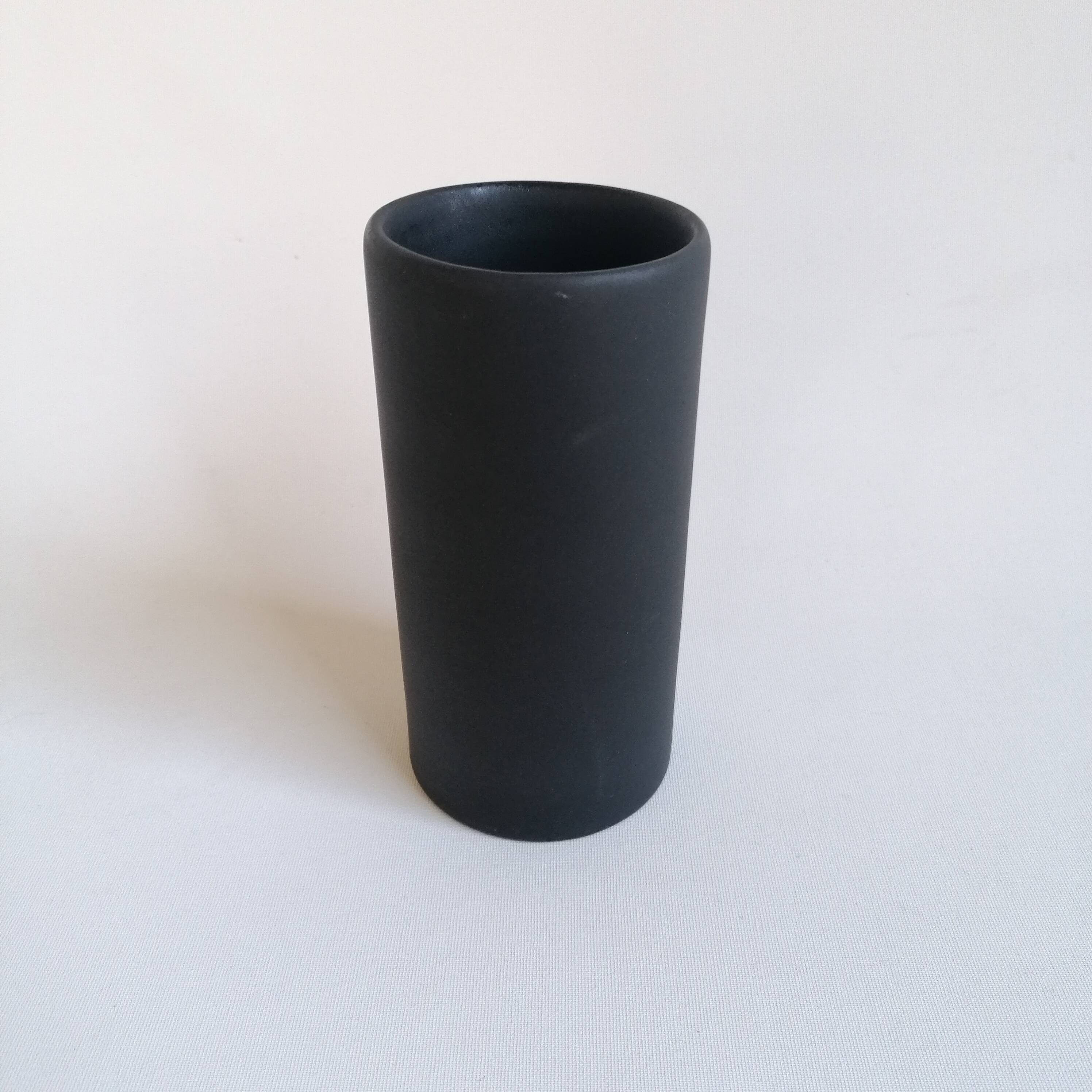 Matte black scroll vase by Antonio Lampecco