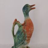 Water jug in slipware from the 1960s. Decorated with a coloured duck. Unmarked.