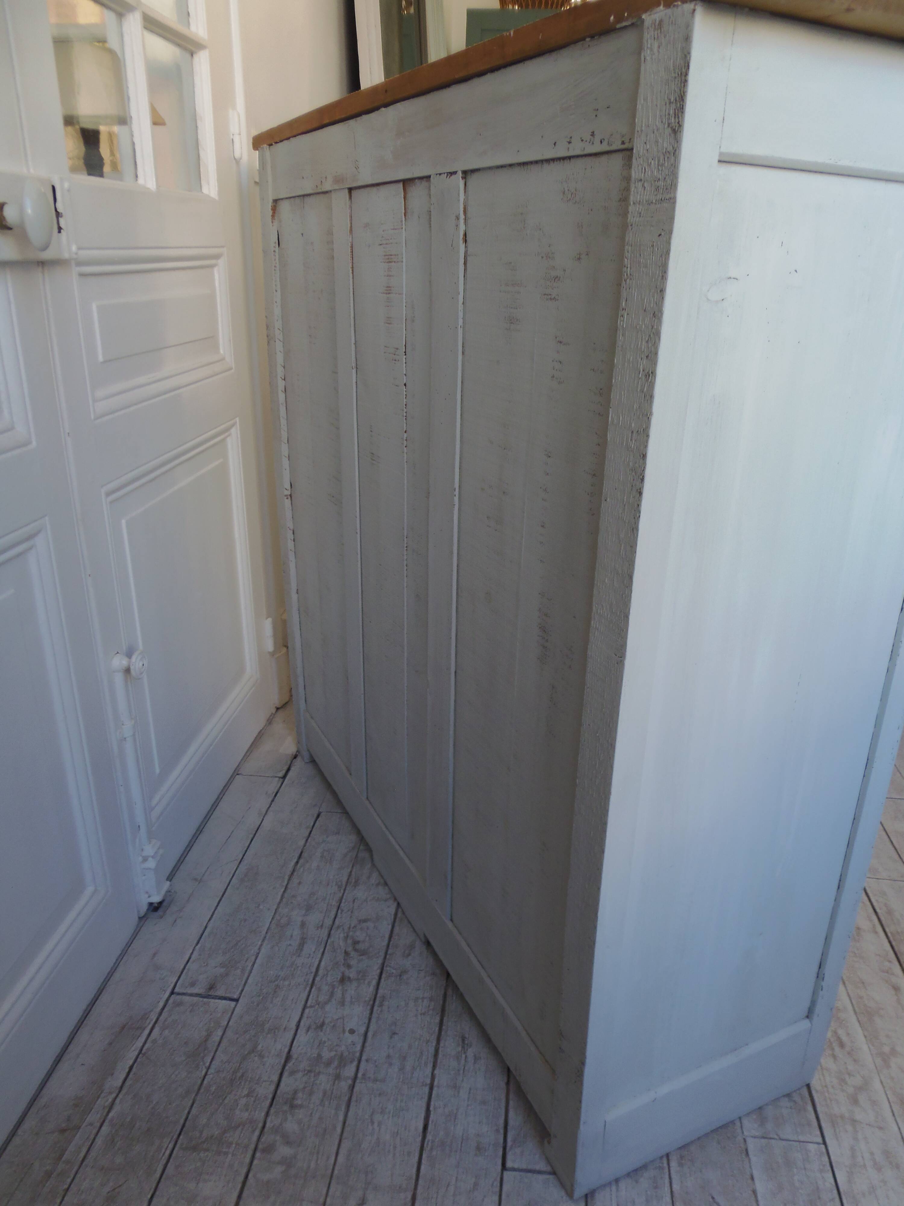 Display case, old shallow sideboard re-enchanted in cloud gray.