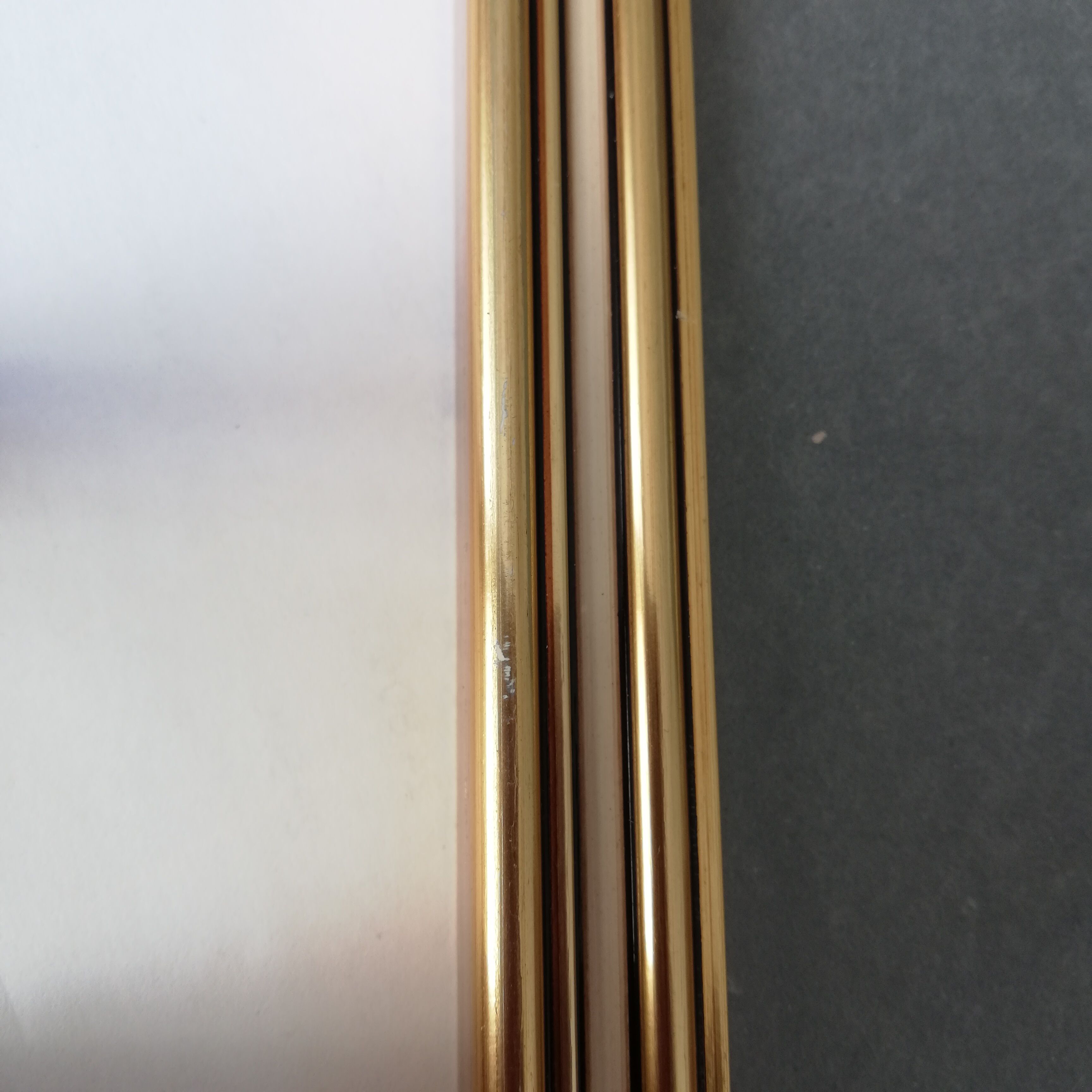 Photo frame under glass, gilded wood