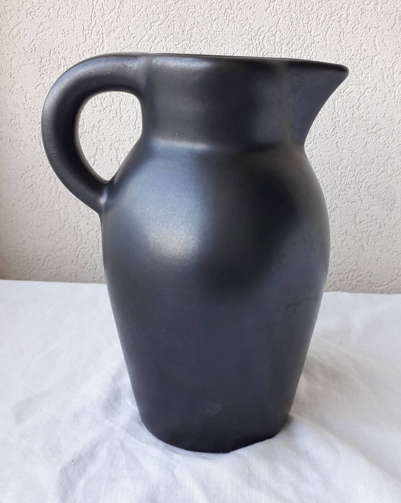 Black ceramic jug