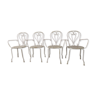 4 wrought iron garden armchairs