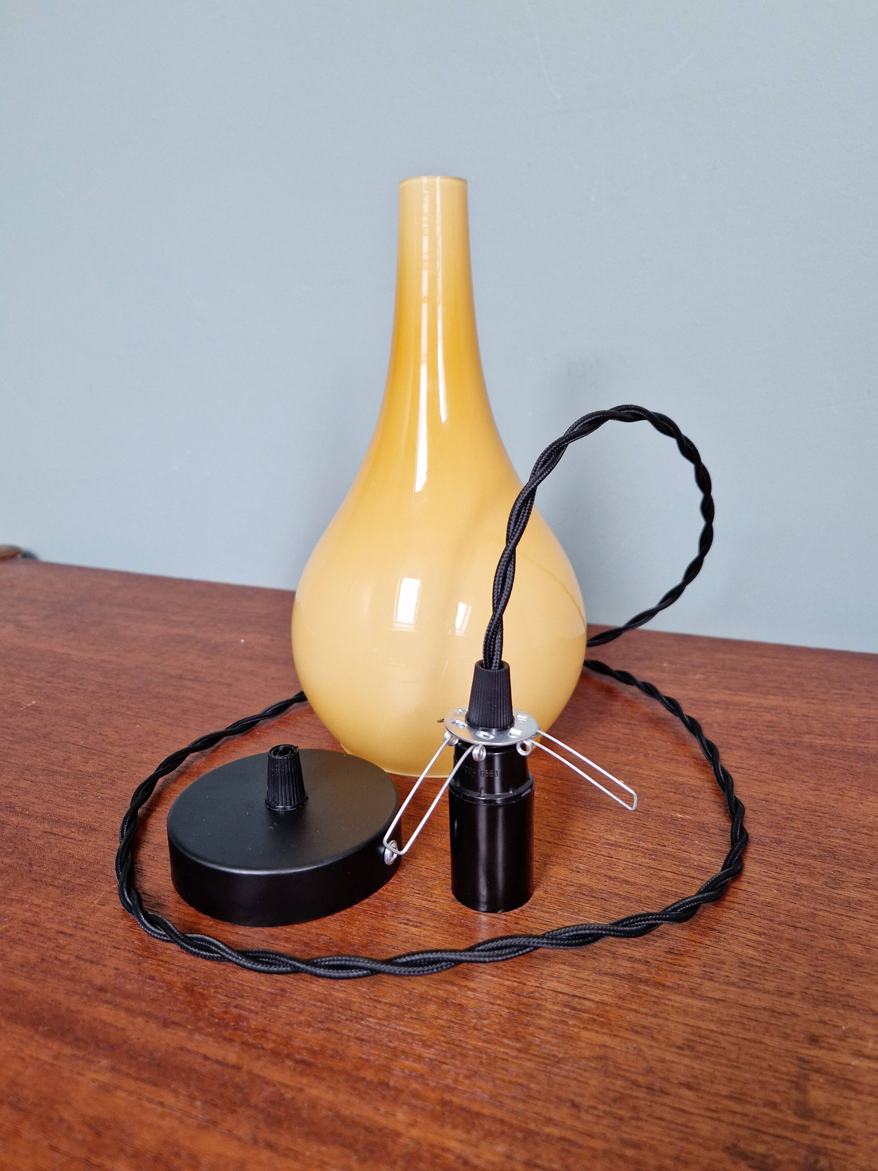 Scandinavian pendant light in honey-colored opaline glass, 1960s