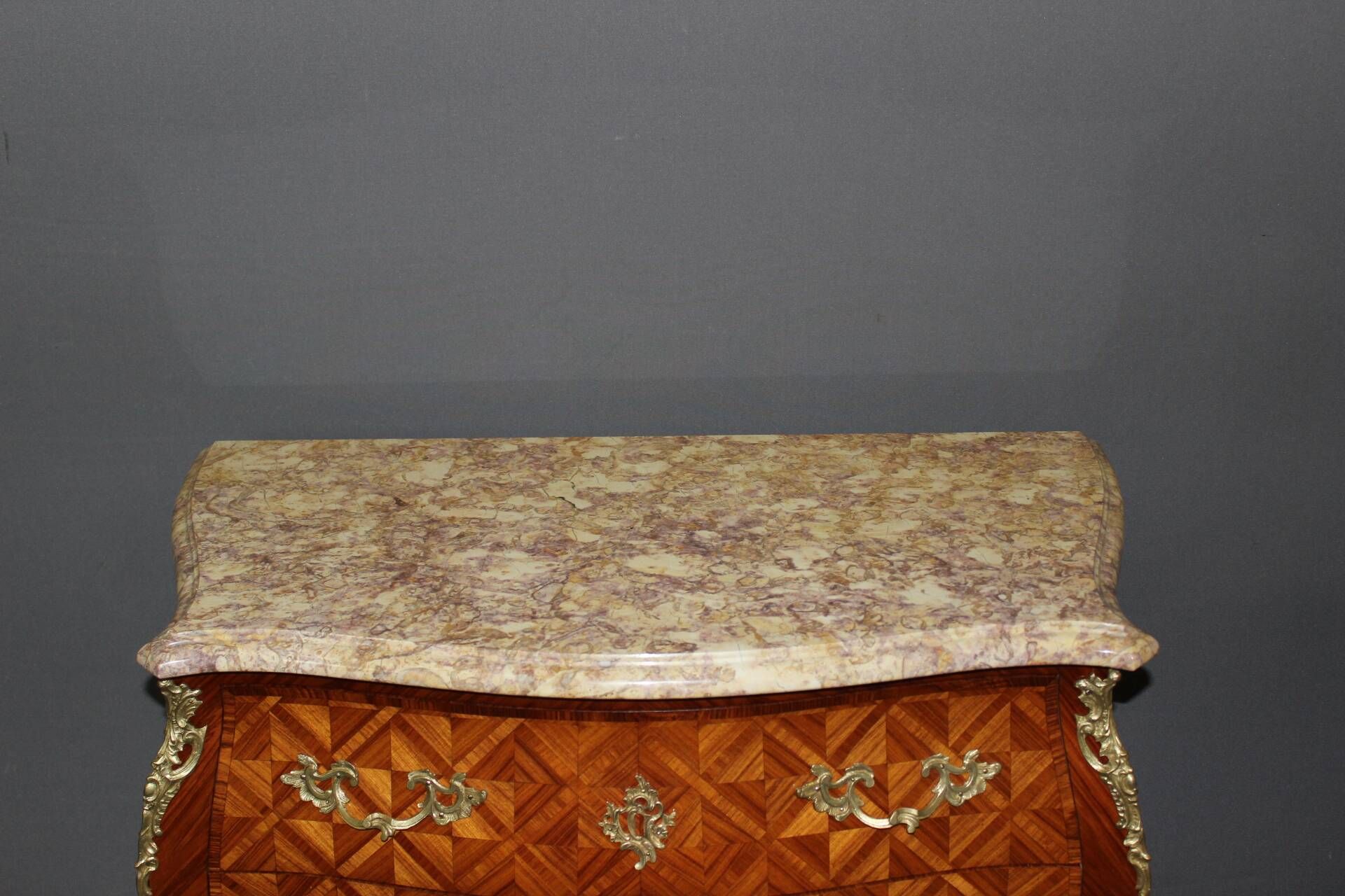 Louis XV commode in marquetry