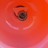 Vintage lamp of the 70s in orange opaline
