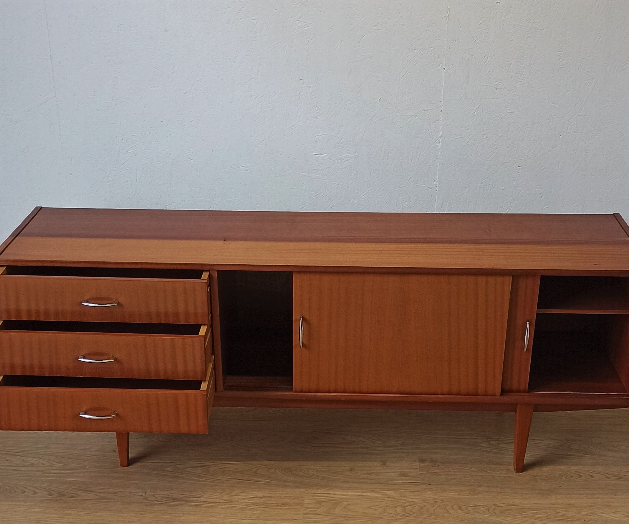 Modernist long sideboard of the 1970s.