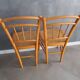 Pair of old caned chairs in blond wood