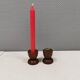 Two beautiful teak candle holders with brass inserts.