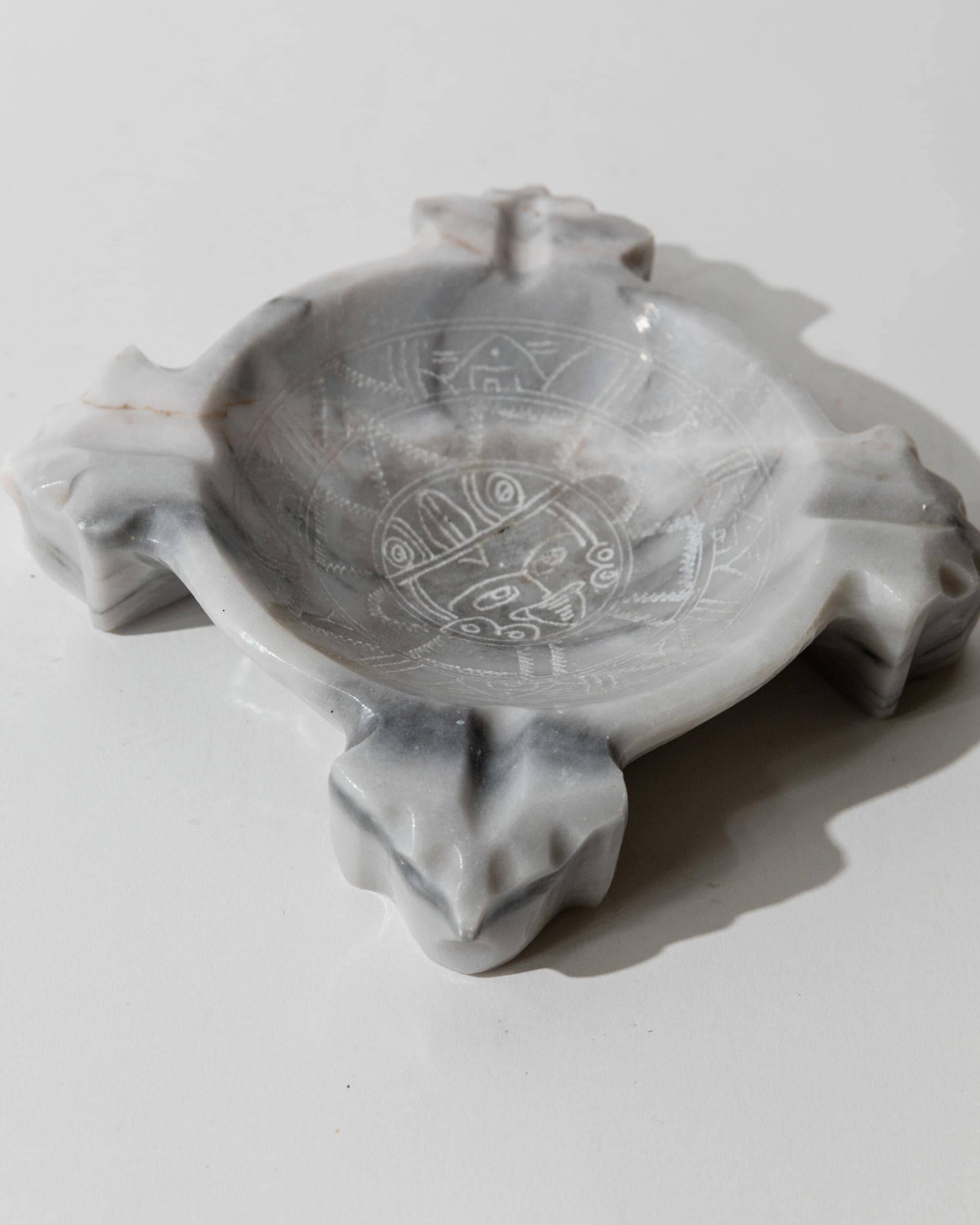 Vintage Mexican marble ashtray from the 1970s, engraved Aztec pattern.