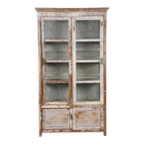 Display case with sliding doors in patinated wood