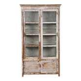 Display case with sliding doors in patinated wood
