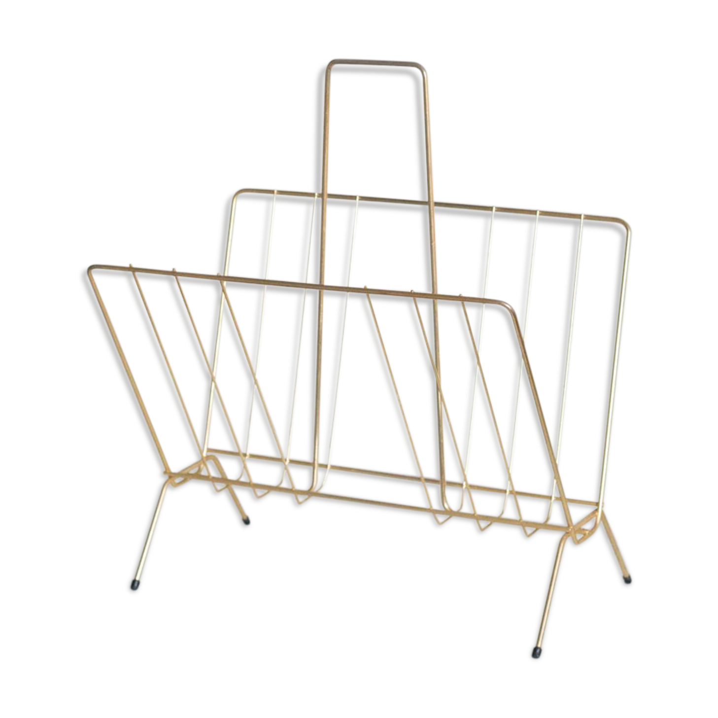 Vintage magazine holder in gold metal