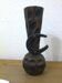 vase en bois sculpté pour fleurs sèches, décoré par un petit fer à cheval