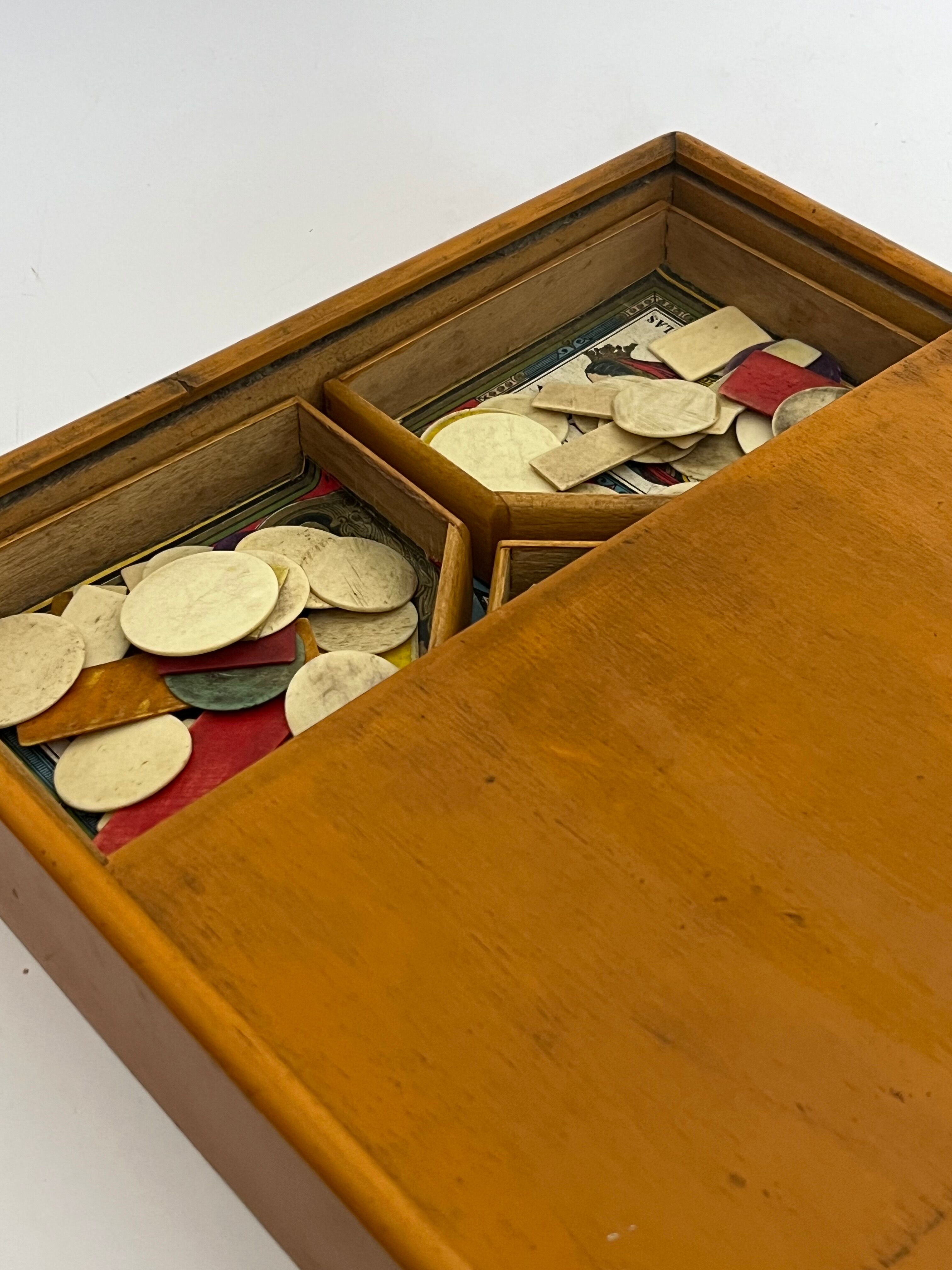 Old game of nain jaune with its bone tokens.