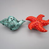 Pair of vintage ceramic salt shaker/pepper maker "starfish and shell"