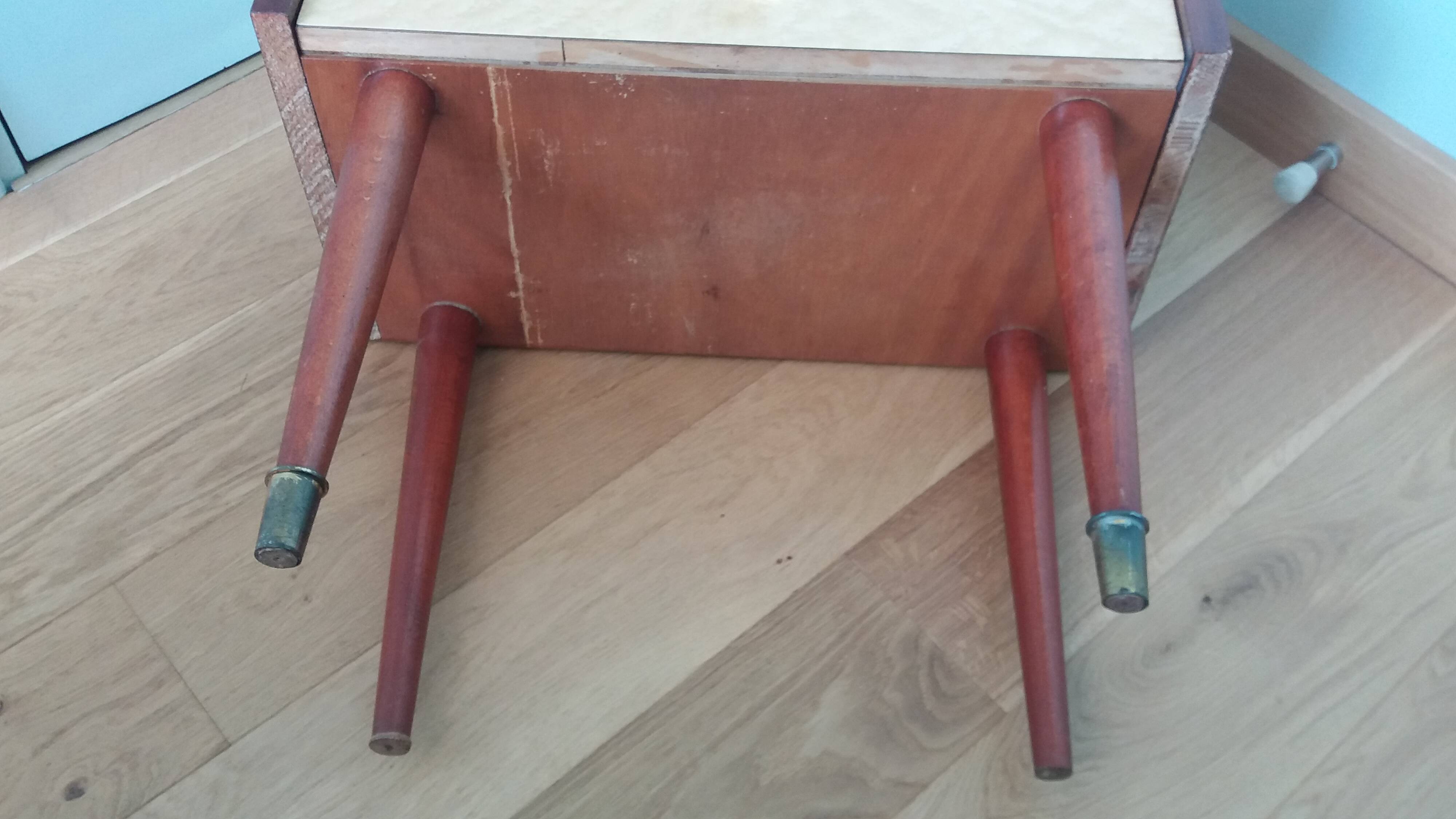 Spindle-legged bedside table