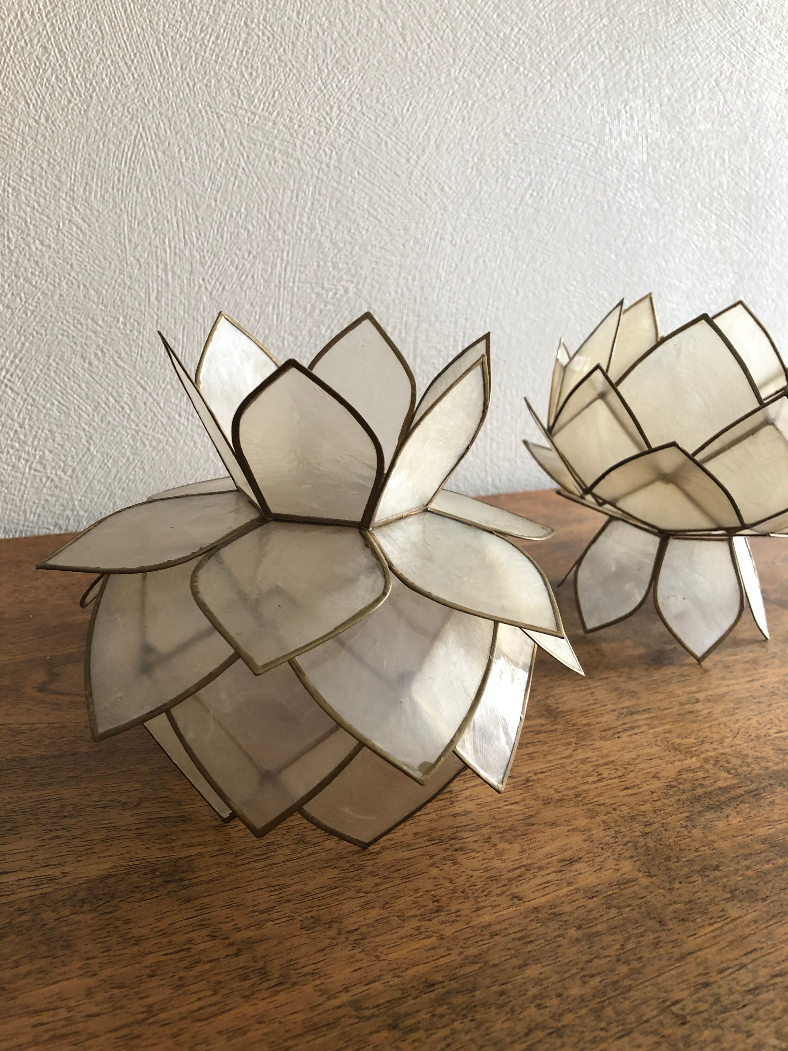 Lotus flowers in mother-of-pearl sconces