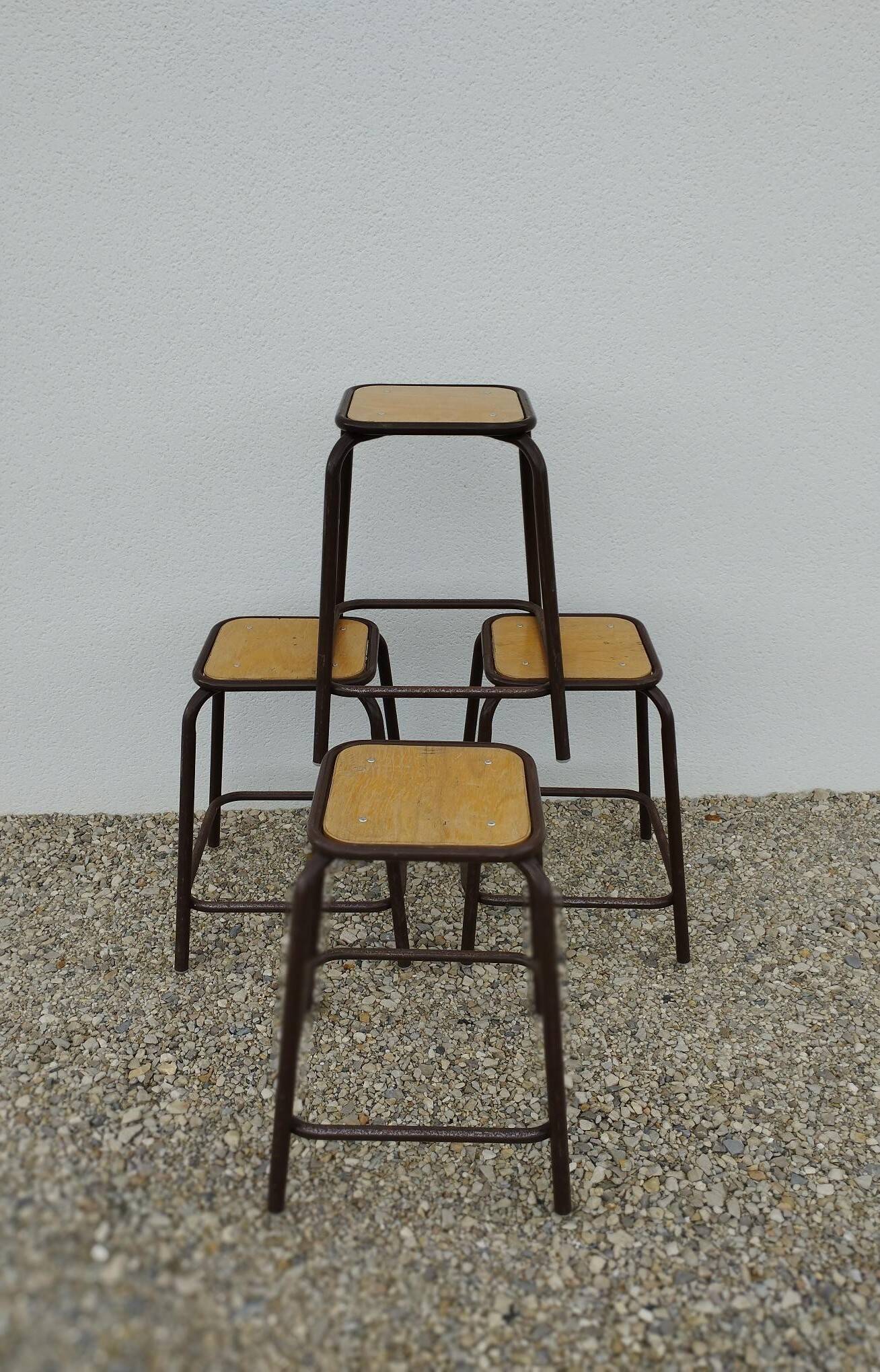 4 vintage stackable workshop stools from Mullca.