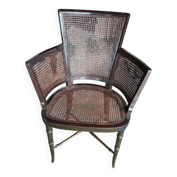 Cane armchair