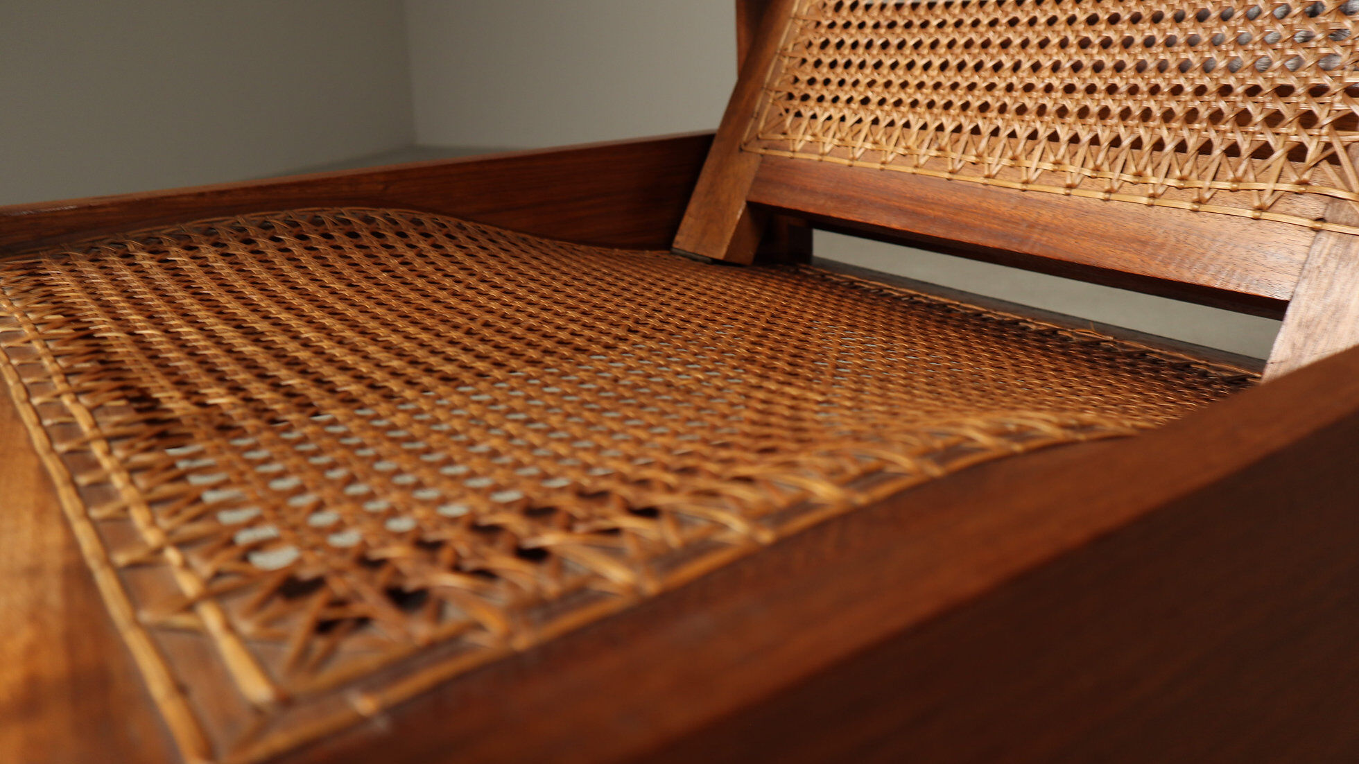Mid-century architectural teak lounge chair with cane seat, 1950s