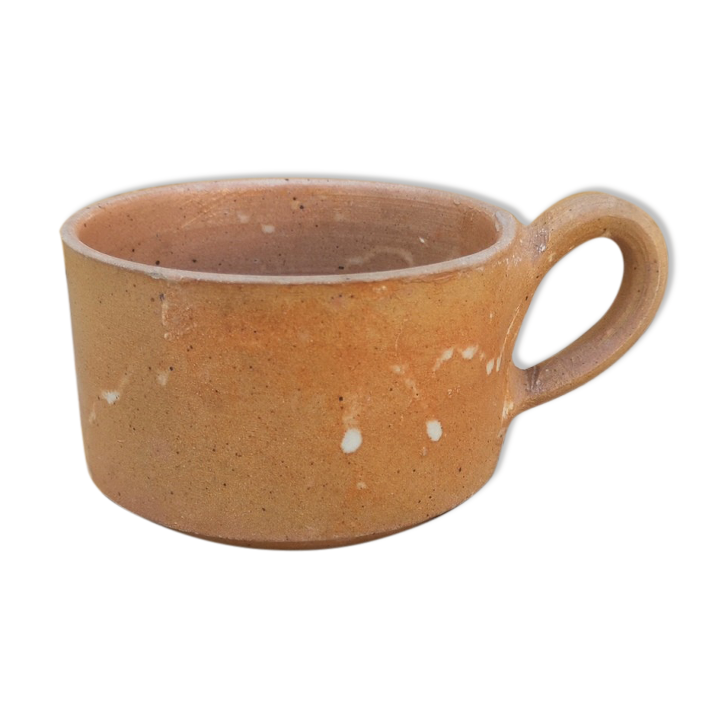 Brown sandstone cup with white spots