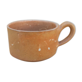 Brown sandstone cup with white spots