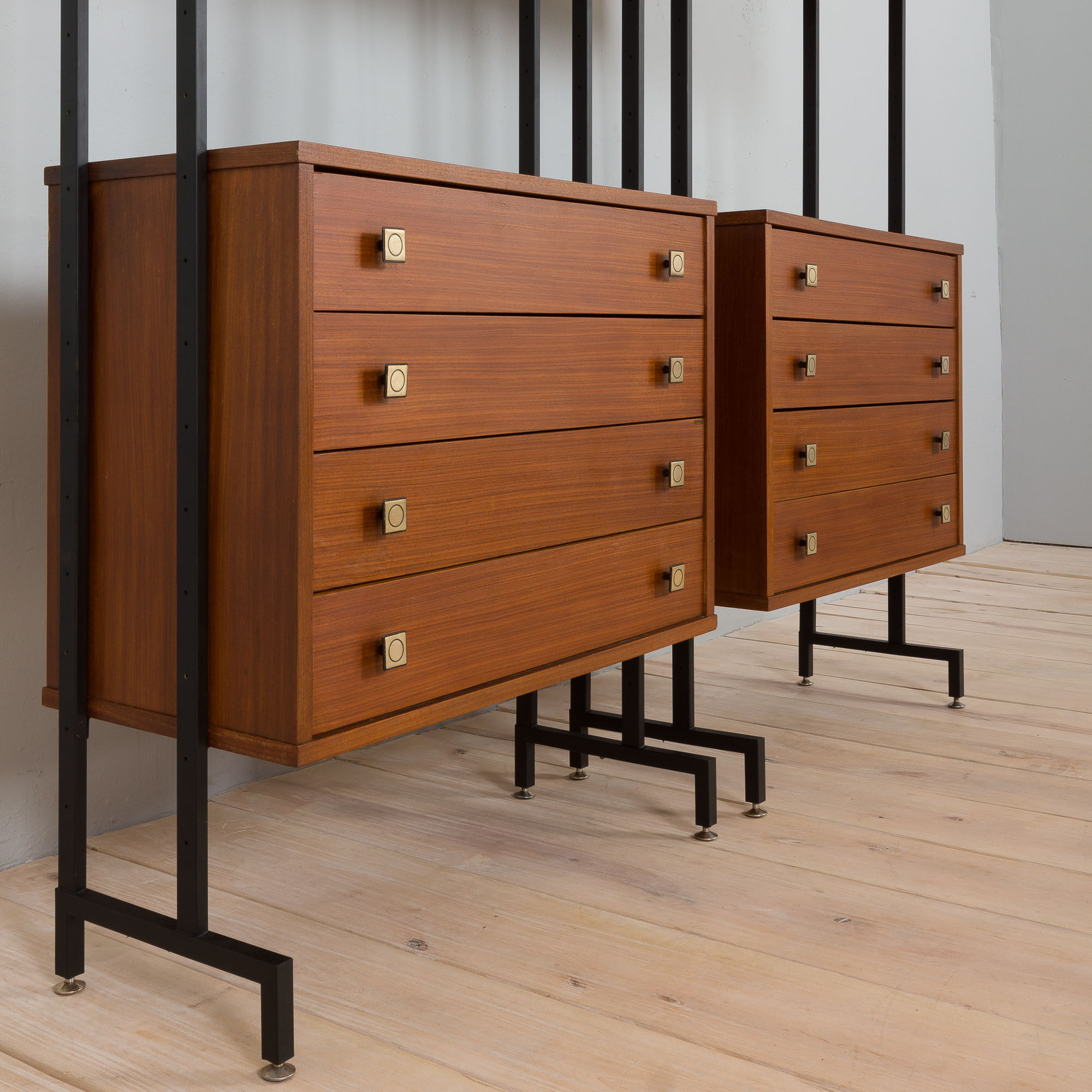 Pair of Italian mid century freestanding wall units in teak with brass handles.