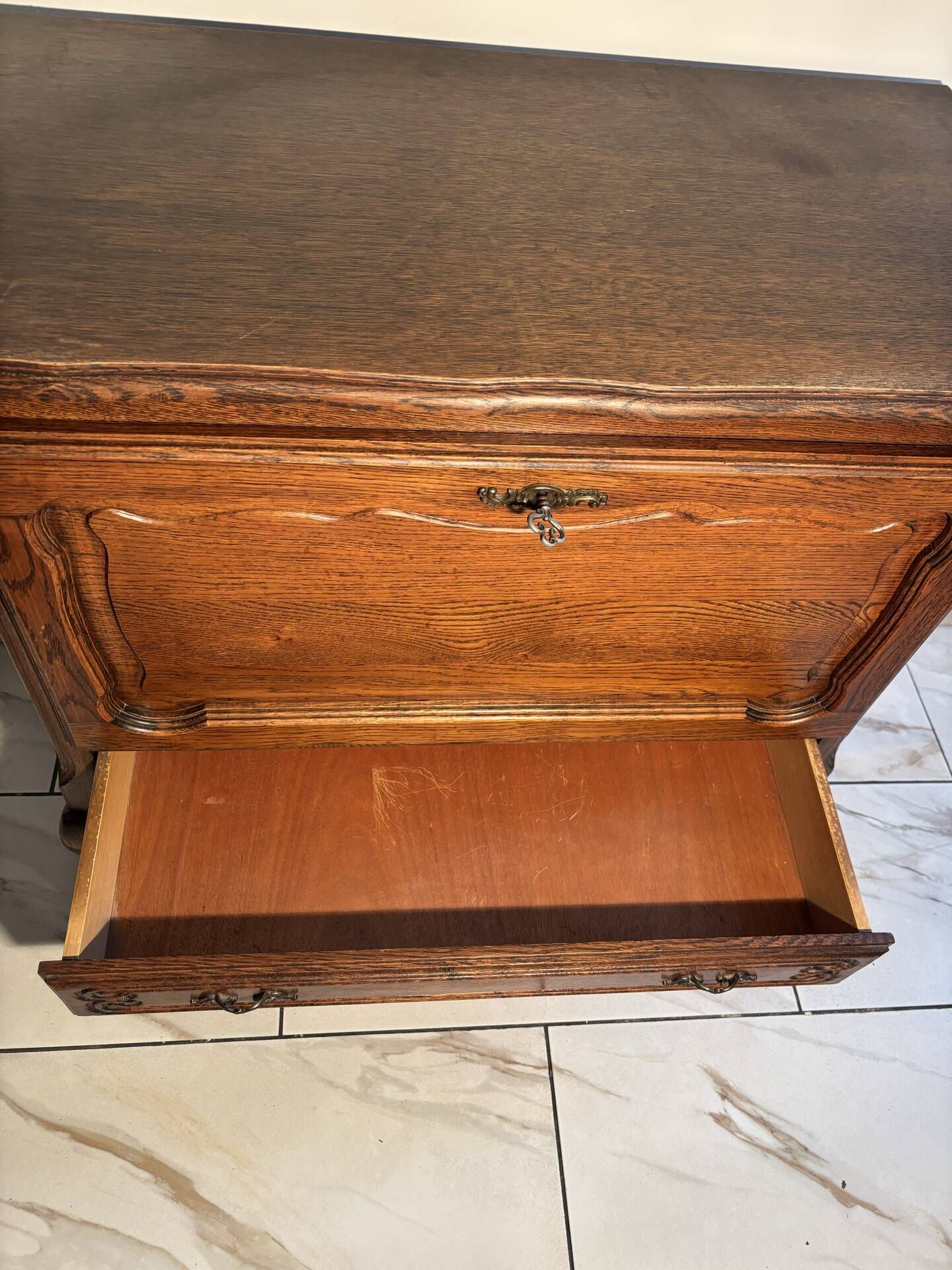 Louis XV style oak TV cabinet with drop-down flap.