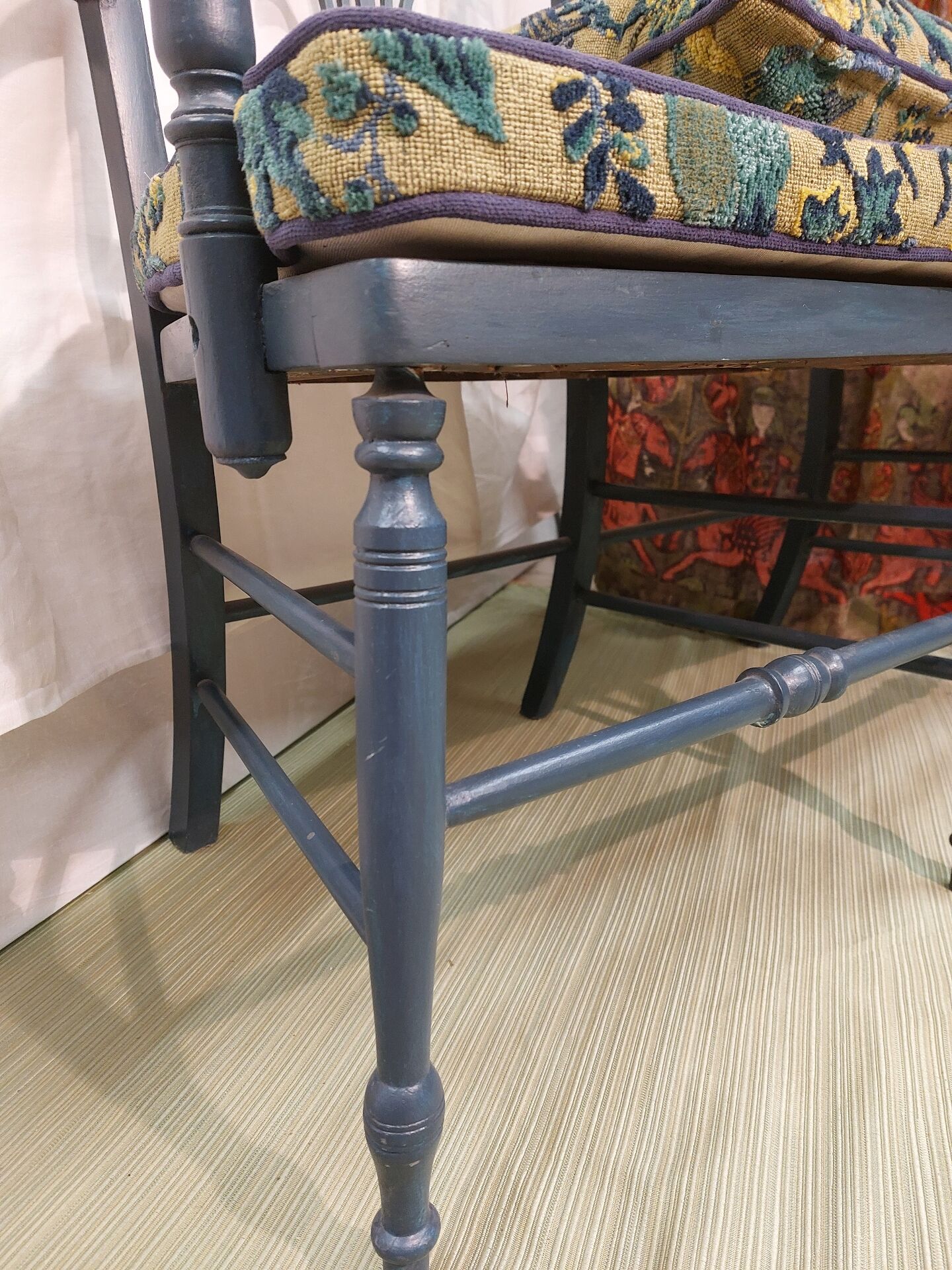 Pretty painted and upholstered bench in green and blue.