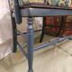 Pretty painted and upholstered bench in green and blue.