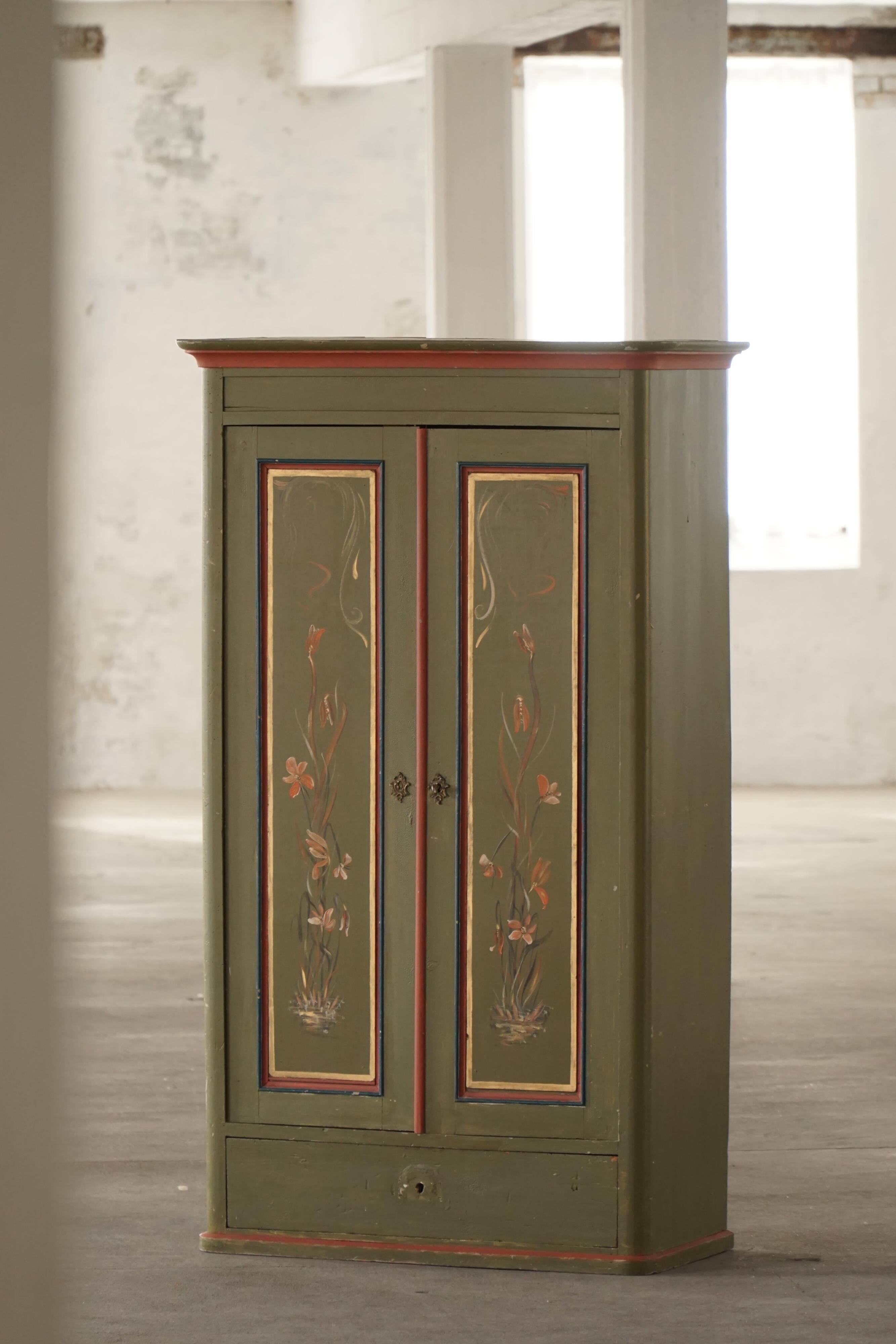 Old Danish cupboard painted with floral patterns, folk art, 19th century.