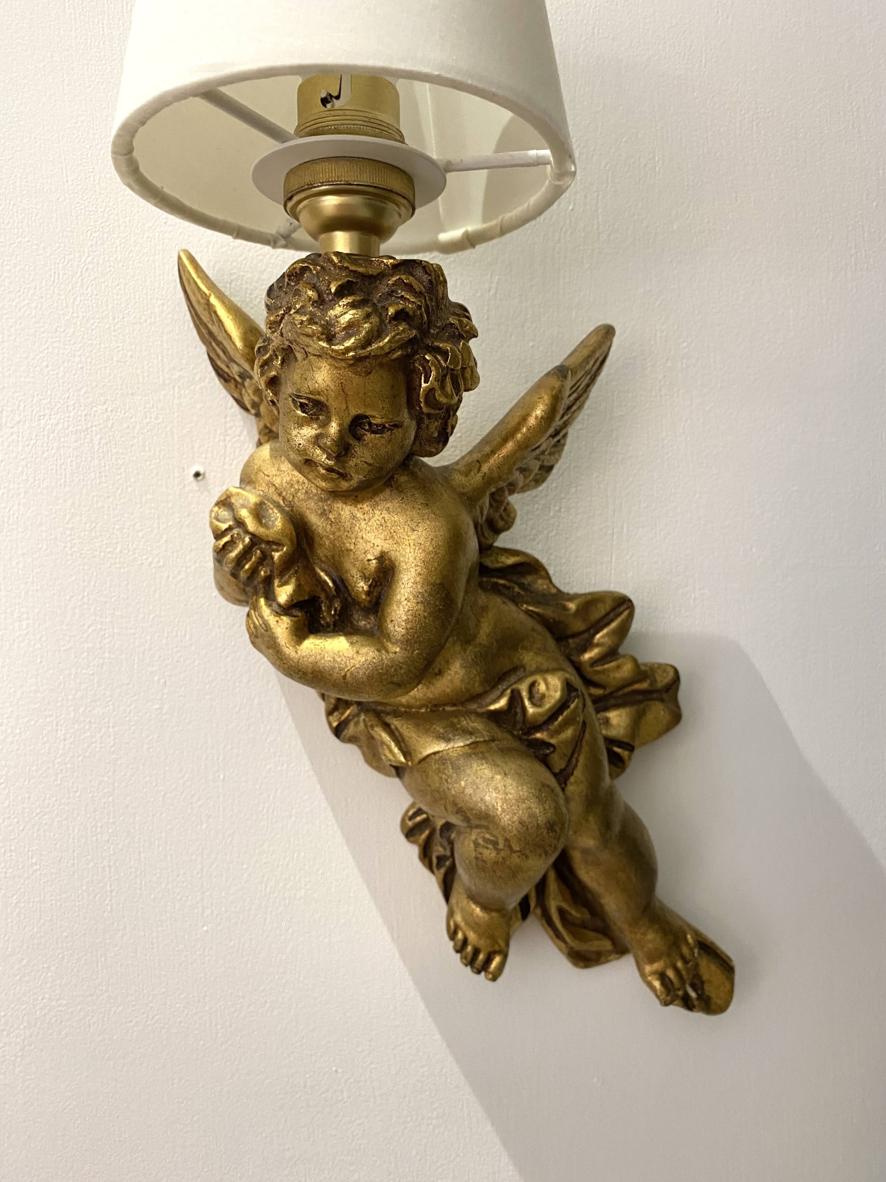 Pair of golden Puttis wall lights
