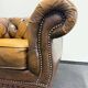 Fauteuil Chesterfield vintage en cuir marron