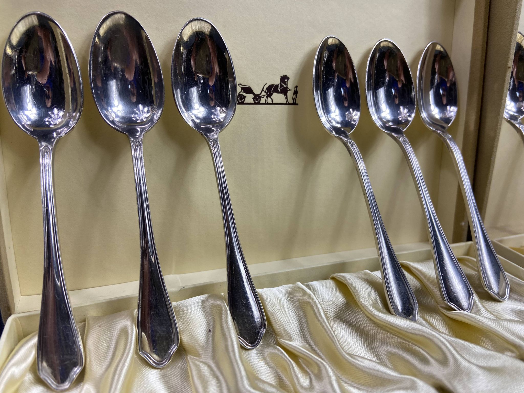 Complete set of 12 Louis XV style mocha spoons in silver-plated metal, Hermès