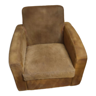 Vintage armchair in upturned skin