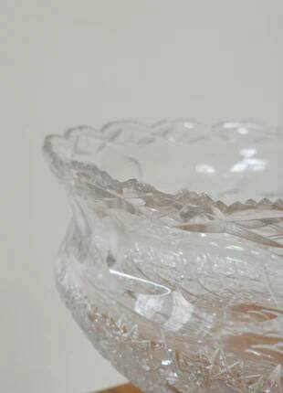 Cut crystal bowl on a brass base in bohemian style.